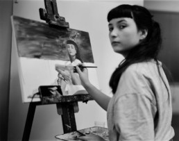 Lucia painting self-portrait